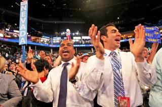 State Sens. Steven Horsford and Ruben Kihuen, both Nevada delegates, cheer for Sen. Harry Reid after his speech at the Democratic National Convention in Charlotte, N.C. Tuesday night.